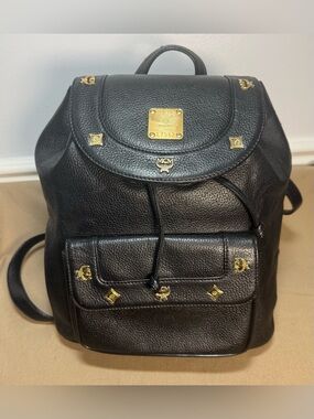 Authentic MCM Black Leather Backpack with Gold Hardware